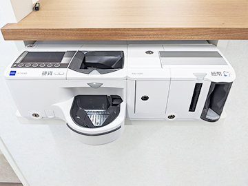 ゆう歯科自動釣銭機